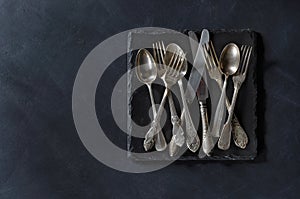 Cutlery on black background