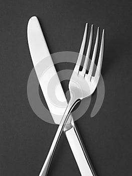 Cutlery on black - Stock Image