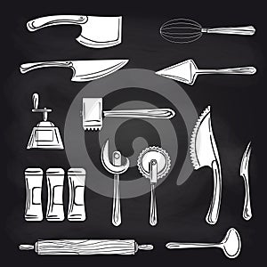 Cutlery on chalkboard background