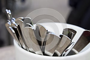 Cutlery in a glass, cafe photo