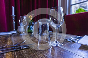 Cutlery and glassware on table