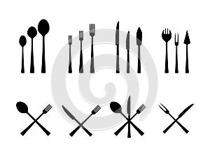 Cutlery icons. Crossed spoon and fork. Dining sharp knife. Tableware black silhouettes. Dish tools. Ladle and teaspoon