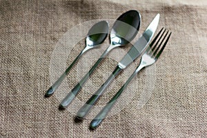 Cutlery for one person on a matting