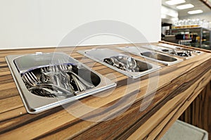 Cutlery output in self service restaurant