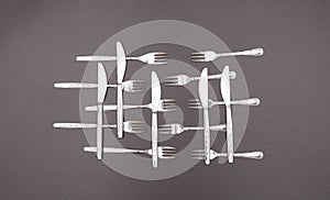 Cutlery set on black table. Concept of cooking and restaurant