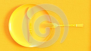 Cutlery on a yellow dish