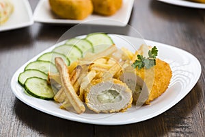 Cutlet de volaille with fries photo