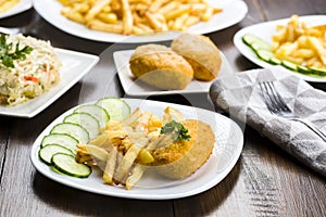 Cutlet de volaille with fries photo