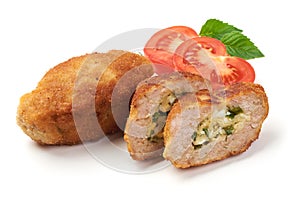 Cutlets cordon bleu with tomatoes, isolated on white background