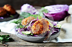 Cutlets with red cabbage and cucumber salad