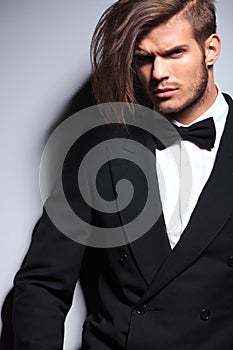 Cutout picture of an elegant young fashion man with long hair