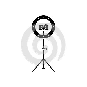 Cutout silhouette Led ring lamp on tripod with camera. Outline icon. Black simple illustration of light for selfie, blogger. Flat