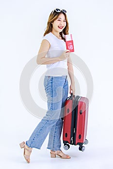  cutout studio full body shot of Millennial Asian young female teenager traveler in casual outfit standing holding