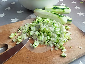 Cutted cucumbers on board for salad fresh recipy