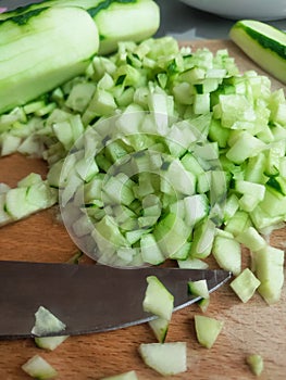 Cutted cucumbers on board for salad fresh recipy