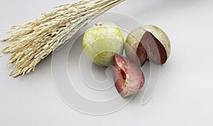 Cutted of Plumcot fruit with red pulp