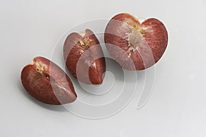 Cutted of Plumcot fruit with red pulp