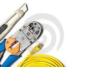 Cutter, crimper, yellow patch cord and connectors