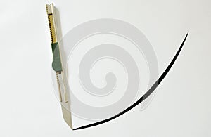 Cutter curve slashing on white paper background photo