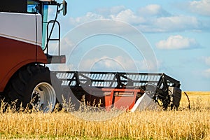 Cutter platform at work. Reaping machine.