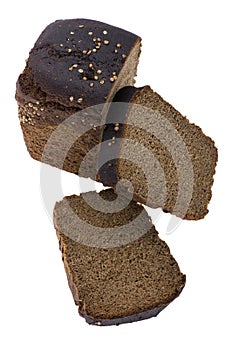 Cutting black bread close up