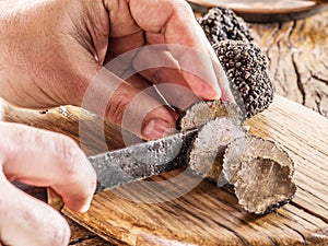 Cutting of black truffle. photo