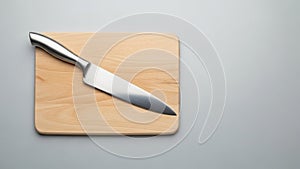 Cutting board. The cutting board is rectangular with rounded