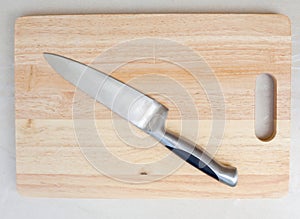 Cutting board knife on wooden boards