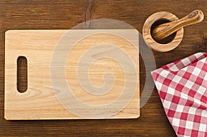 Cutting board with towel and bowl