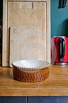 cutting boards and empty salad bowl
