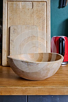 cutting boards and empty salad bowl