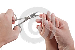 Cutting child fingernail photo