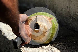 Cutting coconut