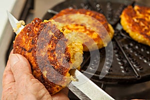 Cutting the cooked corn bread