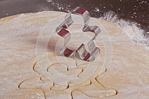 Cutting cookies dough gingerbread man