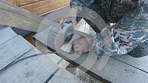 Cutting decorative tiles to the desired size with an angle-grinder