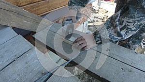 Cutting decorative tiles to the desired size with an angle-grinder