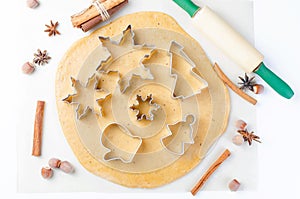 Cutting the gingerbread cookie dough for Christmas and New Year