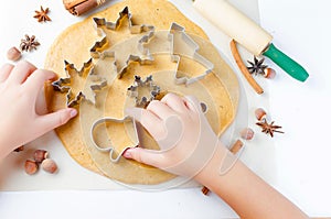 Cutting the gingerbread cookie dough for Christmas and New Year