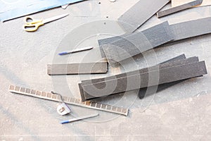 Cutting and grinding concrete or metal using a cut-off saw