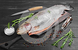 Cutting gutted red fish trout