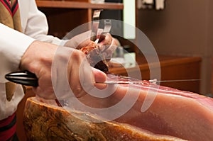 Cutting Jamon Serrano - traditional spanish ham