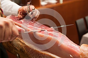 Cutting Jamon Serrano - traditional spanish ham