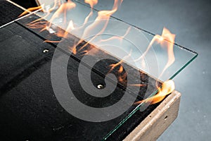 Cutting laminated glass, Burning through the foil connecting the glass panes