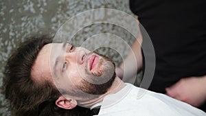 cutting man's beard with the straight razor