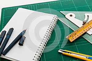 Cutting mats , Pen drawings , adjust angle tool , scale ruler ,