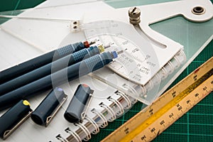 Cutting mats , Pen drawings , adjust angle tool , scale ruler ,