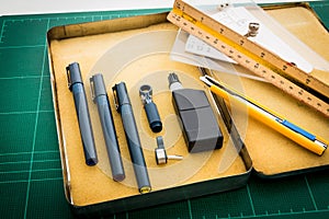 Cutting mats , Pen drawings , adjust angle tool , scale ruler ,