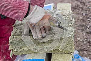 Cutting mineral wool panel with a craft knive