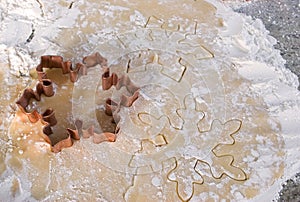 Cutting out snowflake cookies